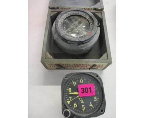 A mid 20th century military ship's compass and a Kollsman black metal cased aeronautical Altitude Altimeter 