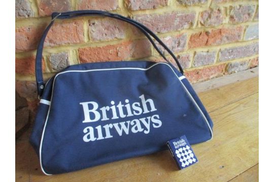A Retro British Airways Cabin Bag Together With A Pack Of British