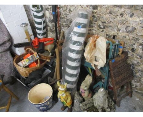 A selection of gardening items and tools to include a work bench, stoneware ornaments and other items 