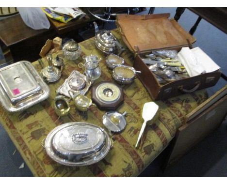 A mixed lot of silver plate to include entree dishes, a barometer, a three-piece tea set, two enamel brushes and silver plate