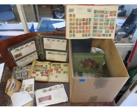Postage stamps from around the world in albums and loose and First Day covers 