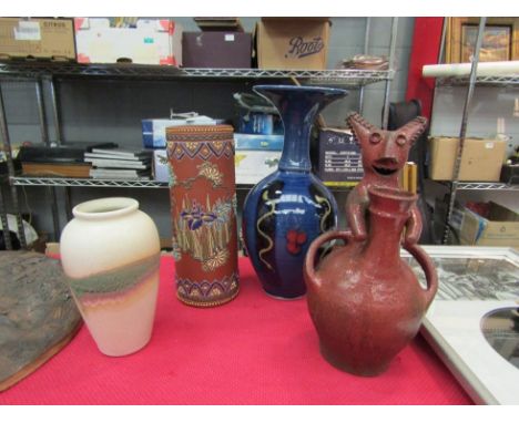 A studio pottery vase with a central raku glazed band, an unusual ceramic bottle vase with figure and two further vases (4) 