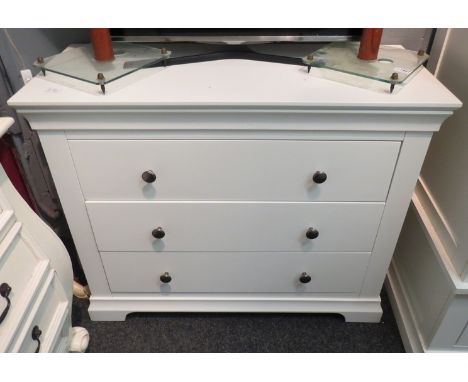 A Cotswold Company white chest of three long drawers on bracket feet, 80.5cm x 100cm x 42cm 