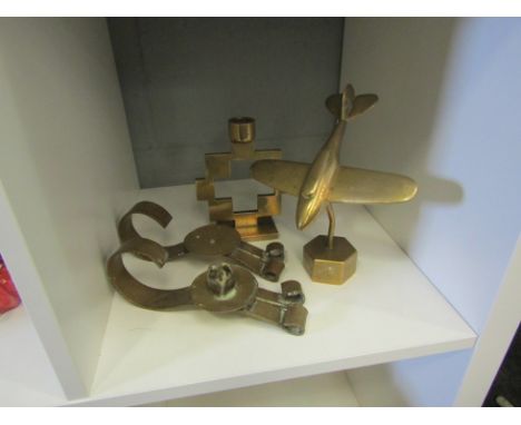 A cast brass model of an aeroplane together with a heavy brass candlestick, also a pair of handbeaten chambersticks a/f (4) 