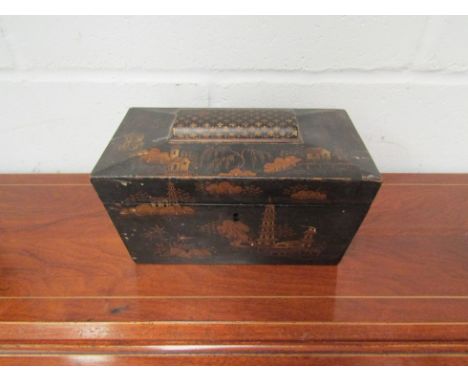 A 19th Century Chinoiserie tea caddy of sarcophagus form 