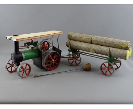 A MAMOD TE1A LIVE STEAM TRACTION ENGINE with canopy top and steering rod, original box and timber carriage with accessories 