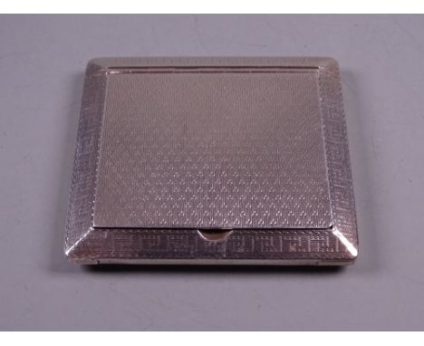 AN ENGINE TURNED SQUARE SILVER STAMP? HOLDER with hinged lid, 1.4 troy ozs, Birmingham 1913 by William Neale