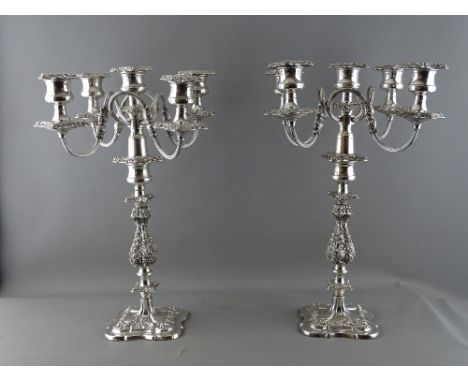 A GOOD LARGE PAIR OF SILVER PLATED FOUR BRANCH TABLE CANDELABRA, 45.5 cms high