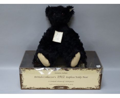 A STEIFF BRITISH COLLECTOR'S 1912 REPLACE TEDDY BEAR in black mohair, button in ear white tag no. 02274/3000, boxed with cert