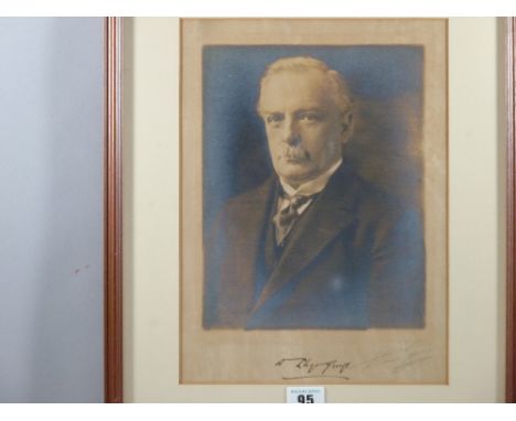 A PHOTOGRAPHIC PORTRAIT OF DAVID LLOYD GEORGE, signed in full beneath, 30 x 22.5 cms