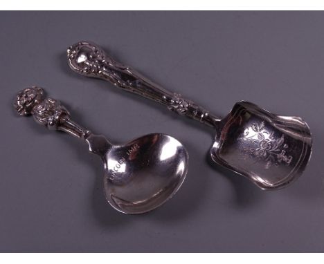 A HEAVY SILVER CADDY SPOON marked 'The Lincoln Imp', 1 troy oz, London 1917 and a caddy spoon with bright cut floral bowl by 