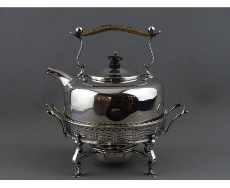 A GEORGE V SILVER KETTLE ON STAND, Birmingham 1910, 24 cms high overall, 16 cms diameter the kettle, inscribed 'T R & E R, Se