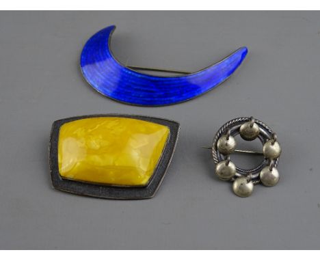 TWO NORWAY & ONE RUSSIA DESIGNER SILVER BROOCHES, to include a blue enamel example by J Tostrup, a circular brooch with dangl