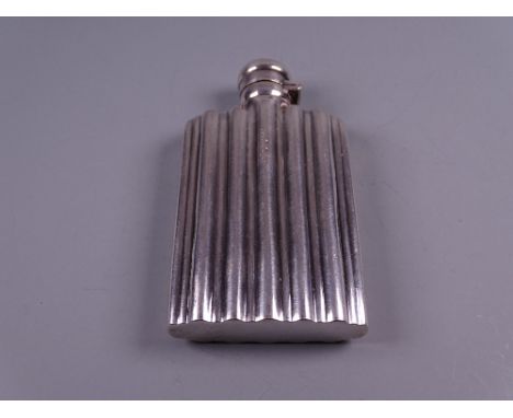 A SILVER POCKET FLASK with ridged decoration and hinged lid, 1.4 troy ozs, Birmingham 1889, maker 'L G'