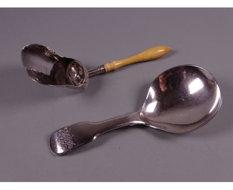 A FIDDLE PATTERNED WILLIAM IV SILVER CADDY SPOON, London 1849 and a Georgian silver 'shovel' caddy spoon with bone handle, ma