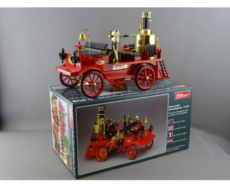 A WILESCO D305 LIVE STEAM VINTAGE FIRE ENGINE, appears unused with original box, instructions and fire blocks etc