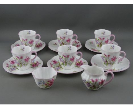 A FOURTEEN PIECE SHELLEY CHINA COFFEE SET of six cups, six saucers, milk jug and sugar basin, decorated in Stocks 13426 patte