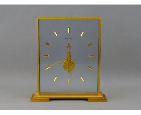 A VINTAGE JAEGER LECOULTRE EIGHT DAY FLOATING SKELETON CLOCK, pattern no. 355, 20 cms high, 18 cms wide, 4.5 cms deep overall
