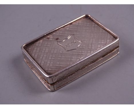 AN OBLONG SILVER SNUFF BOX with hinged lid and raised rim, Birmingham 1839