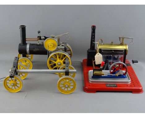 TWO MAMOD LIVE STEAM MODELS including an SP4 stationary engine and a black and yellow traction engine with timber carriage (f