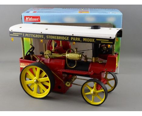 A WILESCO SHOWMAN'S LIVE STEAM TRACTION ENGINE model D409, boxed with paperwork etc, in apparently unused condition