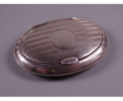 AN OVAL FLAT ENGINE TURNED SILVER SNUFF CONTAINER with hinged lid, 0.9 troy ozs, Birmingham 1911 by Charles Edwin Turner