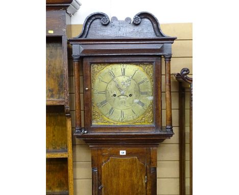 A CIRCA 1800 OAK LONGCASE CLOCK having a brass dial and eight day movement by Michael Thomas, Caernarfon, 218 cms high, 52 cm