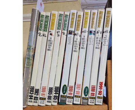 AUTOMOBILE YEAR:&nbsp;1958 edition, publishers grey cloth with dustjacket, rubbed to extrems: together with 11 vols 'Autocour