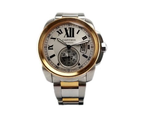 Calibre De Cartier W7100036 Men's Watch. Contemporary and refined, the Calibre de Cartier watch reinterprets the round form i