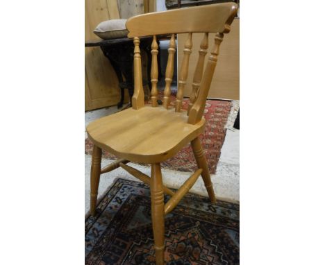 A set of four modern stained beech framed stick back kitchen chairs together with an upholstered dressing stool on cabriole l