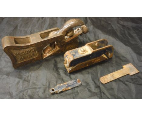 A Record No 311 rebate plane, together with another smaller plane and a Record improved combination plane No 050 with instruc