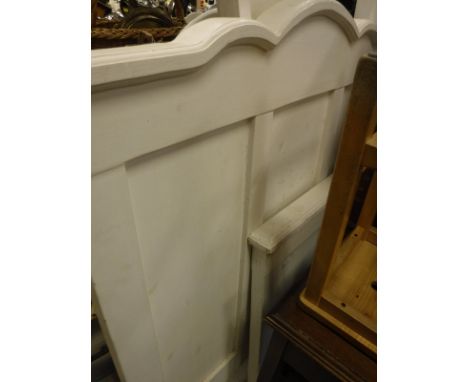 A white painted single bed frame, a modern mahogany side table with applied moulded edge above a single drawer on square sect