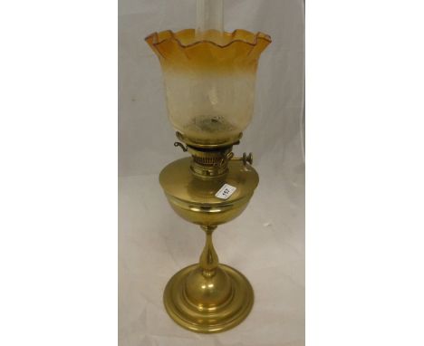 A Victorian brass oil lamp with floral etched clear and yellow shade, a pair of brass firedogs and fireside companion tools C