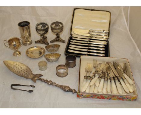 A box of silver and plated wares to include a set of mother of pearl handled fruit knives and forks, various silver handled b