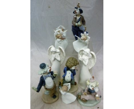 A pair of modern Belleek living blanc de chine figures of angels, together with a set of four Nao child angel figurines circa