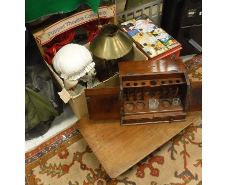 A mahogany medical instrument cabinet by Arnold & Sons of London, a brass student's lamp, mahogany miniature table, toy mouse