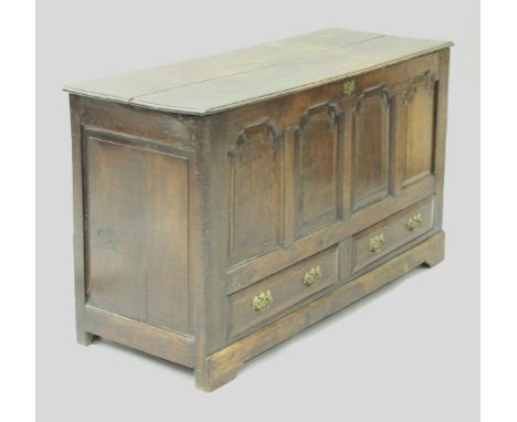 An 18th Century oak mule chest, the two plank top over four fielded panels and two drawers on bracket feet,    CONDITION REPO