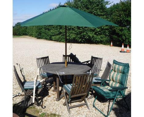 A Skyline teak patio set of an octagonal table with six chairs with cushions and parasol, together with two green painted met
