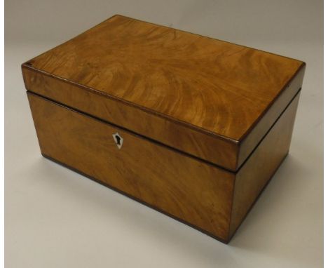 A 19th Century satinwood tea caddy with two sections to the interior, together with a satinwood box with lift top above a sin