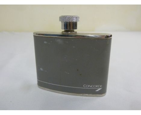 A Concorde metal hip flask