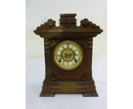 Oak cased mantle clock, enamel dial two train movement