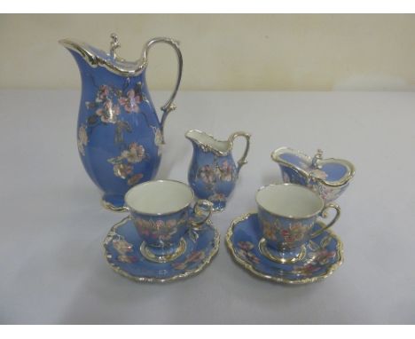 Tirschenreuth coffee set for two to include cups, saucers, milk jug, sugar bowl and coffee pot, with silver overlay  (9)