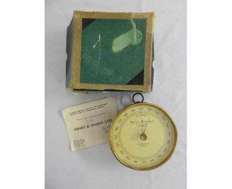 An aneroid barometer by Short and Mason in original packaging