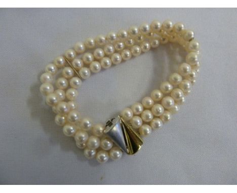 Three row pearl bracelet with 14ct gold clasp