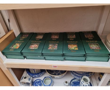 A set of twenty Harmony Kingdom 'Picturesque' tile figures,&nbsp;each boxed, with magnetic frame. 