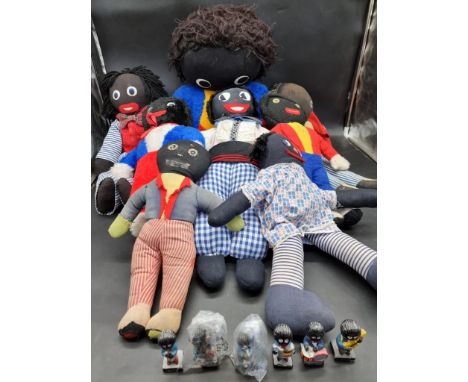 A collection of eight vintage and later soft bodied golly figures; together with six Robertson composition examples. These it