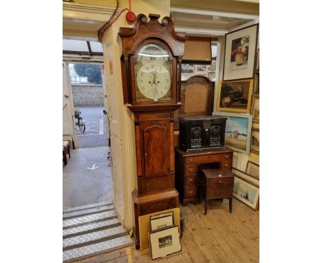 An early 19th century mahogany and inlaid eight day longcase clock, the 14in painted dial with moon phase arch, inscribed 'Kn