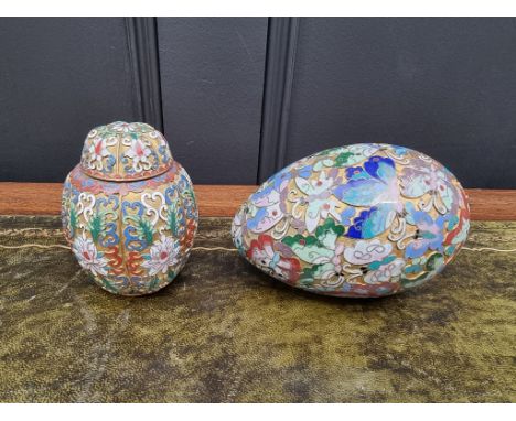 A Chinese cloisonne enamel jar and cover,&nbsp;10cm high; together with a similar egg, 13.5cm high. (2)&nbsp; 