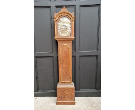 An 18th century oak, painted and parcel gilt 8 day longcase clock, the 11in arched brass dial inscribed 'John Vise, Wisbech',