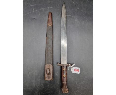 A Victorian British Army 1888 MkII Lee Metford bayonet and scabbard, by Wilkinson Sword, the 30cm blade stamped 'VR WD' and d